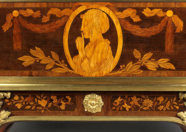 Detail of pictorial marquetry, showing the figure of silence. Roll-top desk (F102).
