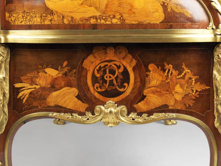 A detail of pictorial marquetry, showing two horns of plenty and the comte d'Orsay's initial, and mounts on the side of the desk. Jean-Henri Riesener, Roll-top desk, about 1770 (F102).