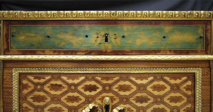 Detail of blue-stained marquetry in the frieze, which has escaped light damage. Attributed to Jean-Henri Riesener, Chest-of-drawers, 1780 (F247).
