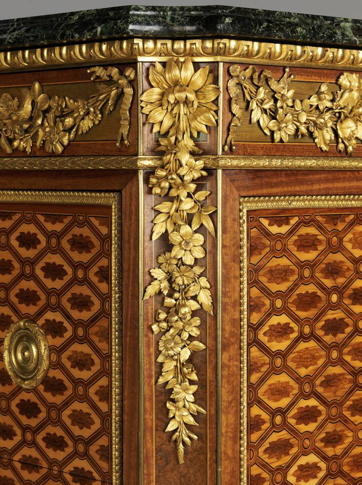 Detail of floral gilt-bronze mount. Attributed to Jean-Henri Riesener, Chest-of-drawers, 1780 (F247).