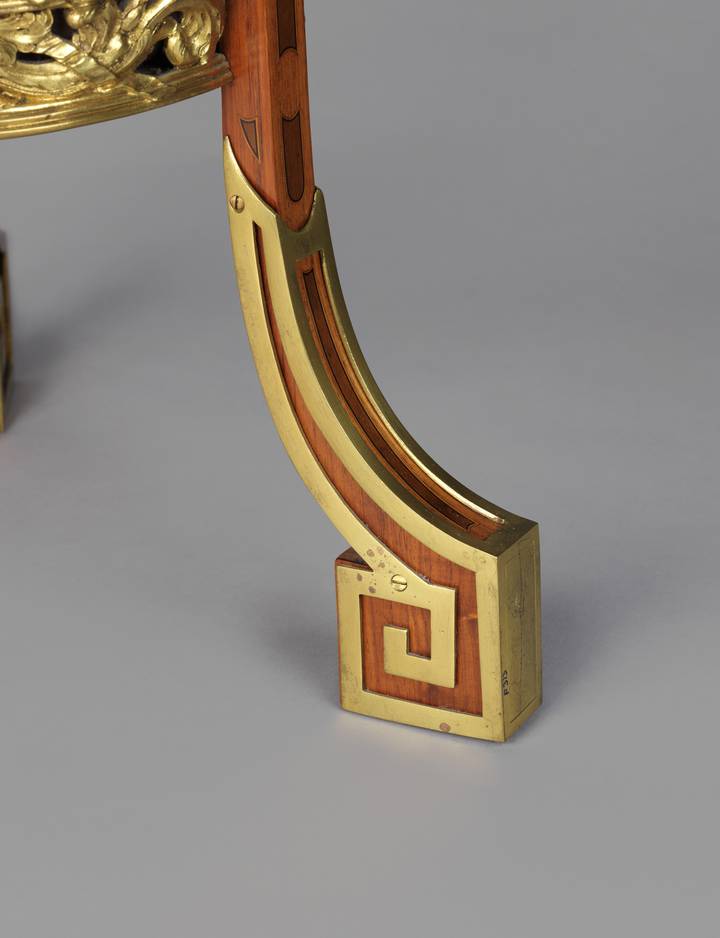 Detail of a rectangular-shaped foot, mounted with gilt-bronze mount in the form of a Greek key. Work-table (F313).