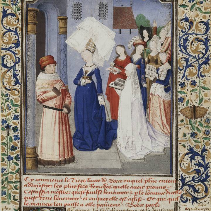 A miniature depicting multiple figures against a castle