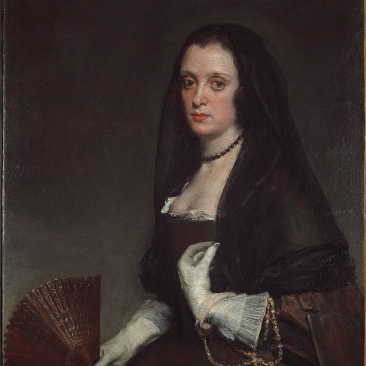 A portrait of a woman with a fan