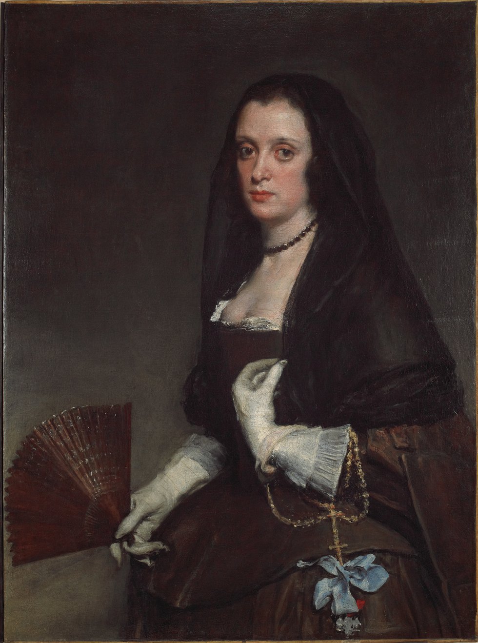 A portrait of a woman with a fan