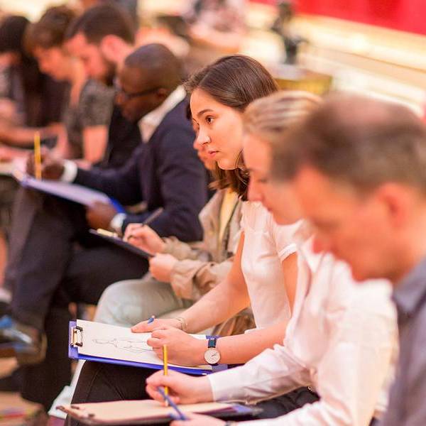 woman and group in theatre